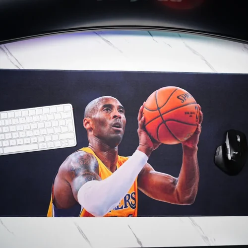 Top-down view of a Kobe Bryant Lakers desk mat with keyboard and mouse