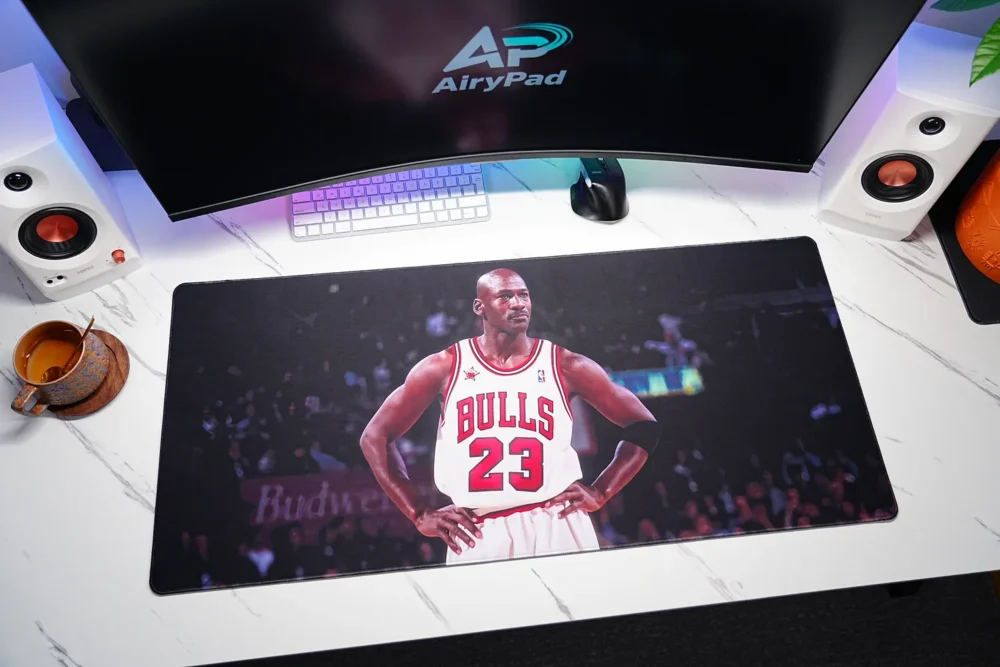 Michael Jordan Chicago Bulls desk mat in a desktop setup with monitor, keyboard and mouse