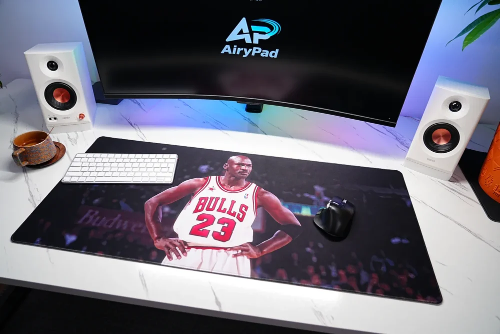 Michael Jordan Chicago Bulls desk mat below a monitor in a coordinated desktop setup