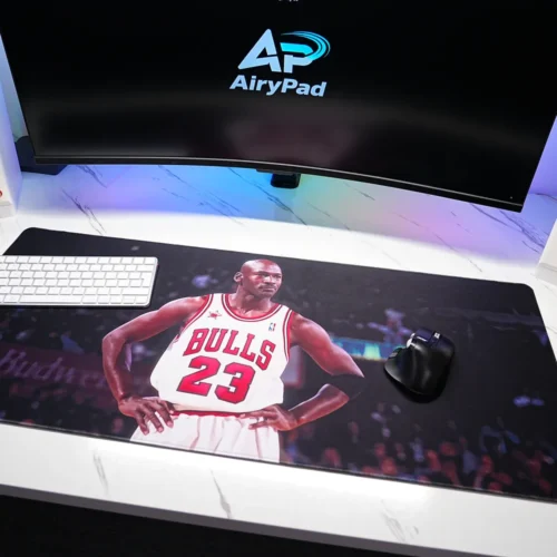 Michael Jordan Chicago Bulls desk mat below a monitor in a coordinated desktop setup