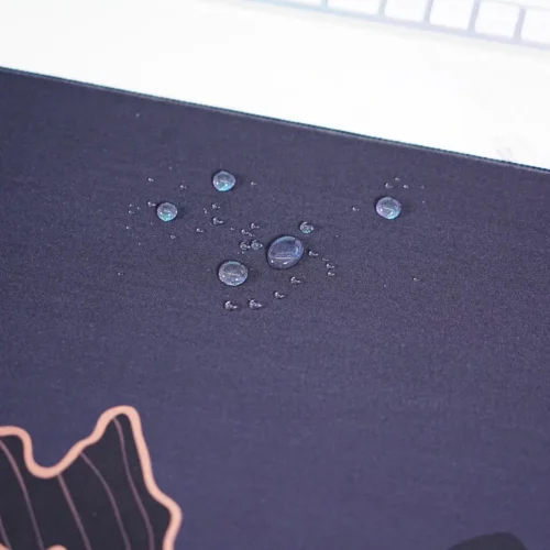 Crescent Moon Mountain mouse pad close-up showing spill-resistant fabric surface