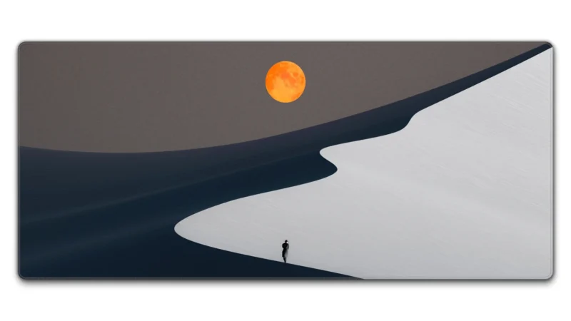 Orange Moon Desert Walker desk mat in 90 x 40 cm with orange moon, desert sky and walking figure artwork