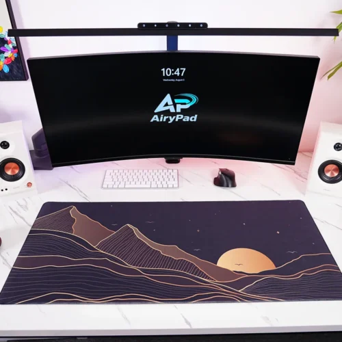 Starry Mountain Sunset desk mat in a full workstation setup with keyboard and mouse