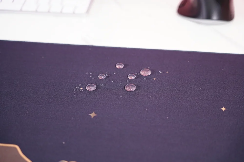 Starry Mountain Sunset mouse pad close-up showing spill-resistant fabric surface