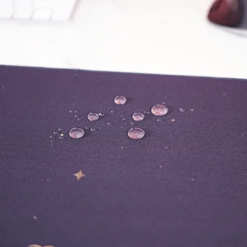 Starry Mountain Sunset mouse pad close-up showing spill-resistant fabric surface