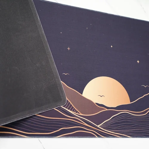 Starry Mountain Sunset mouse pad close-up showing stitched edge and rubber base