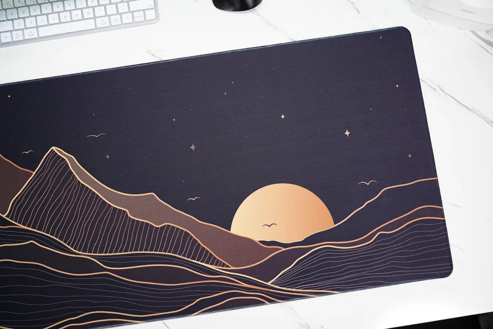 Close-up of Starry Mountain Sunset mouse pad showing sun and star artwork detail