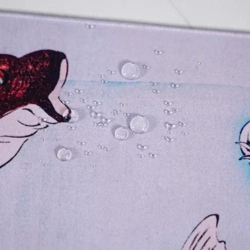 Water-Resistant Koi Fish Mouse Pad Surface Water-resistant koi fish mouse pad surface with water droplets close-up