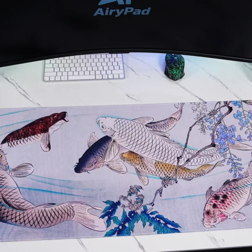 Wisteria Koi Fish Desk Mat with Keyboard and Mouse Wisteria koi fish desk mat shown under keyboard and mouse in a workspace setup